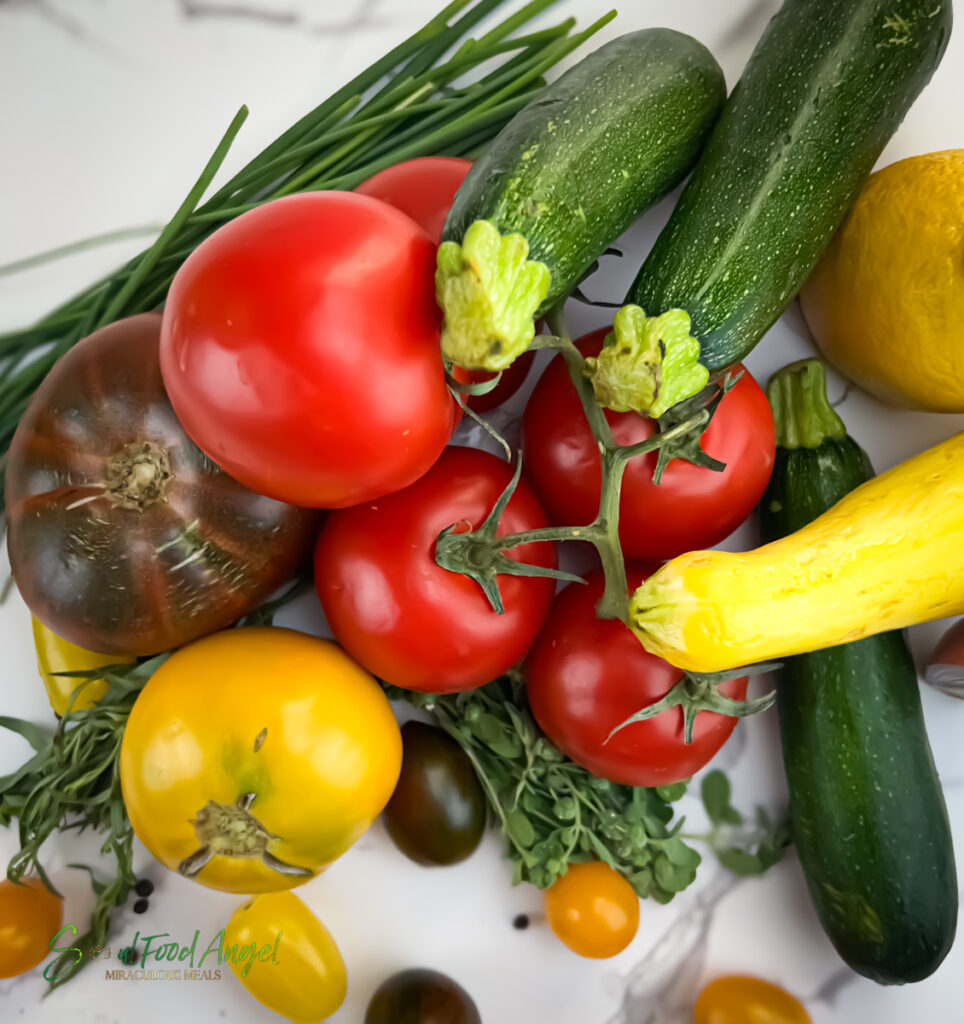 Fresh produce for Sea Bass with Tomatoes and Summer Squash recipe