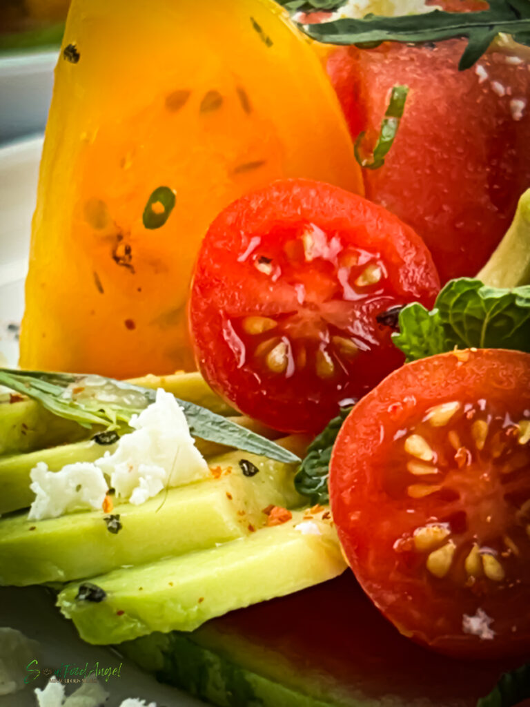 Tomato watermelon salad with harissa vinaigrette, close up