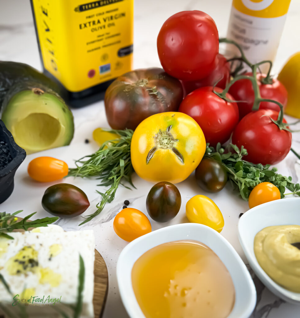 Displayed ingredients for Tomato Watermelon Salad with Harissa Vinaigrette