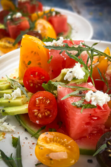 Tomato watermelon salad with harissa vinaigrette