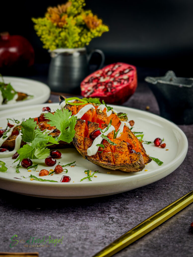 Crispy loaded sweet potatoes, plated and ready to eat, side shot