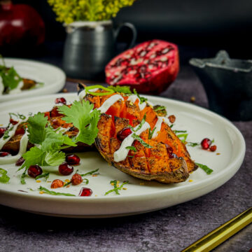 Crispy loaded sweet potatoes, plated and ready to eat